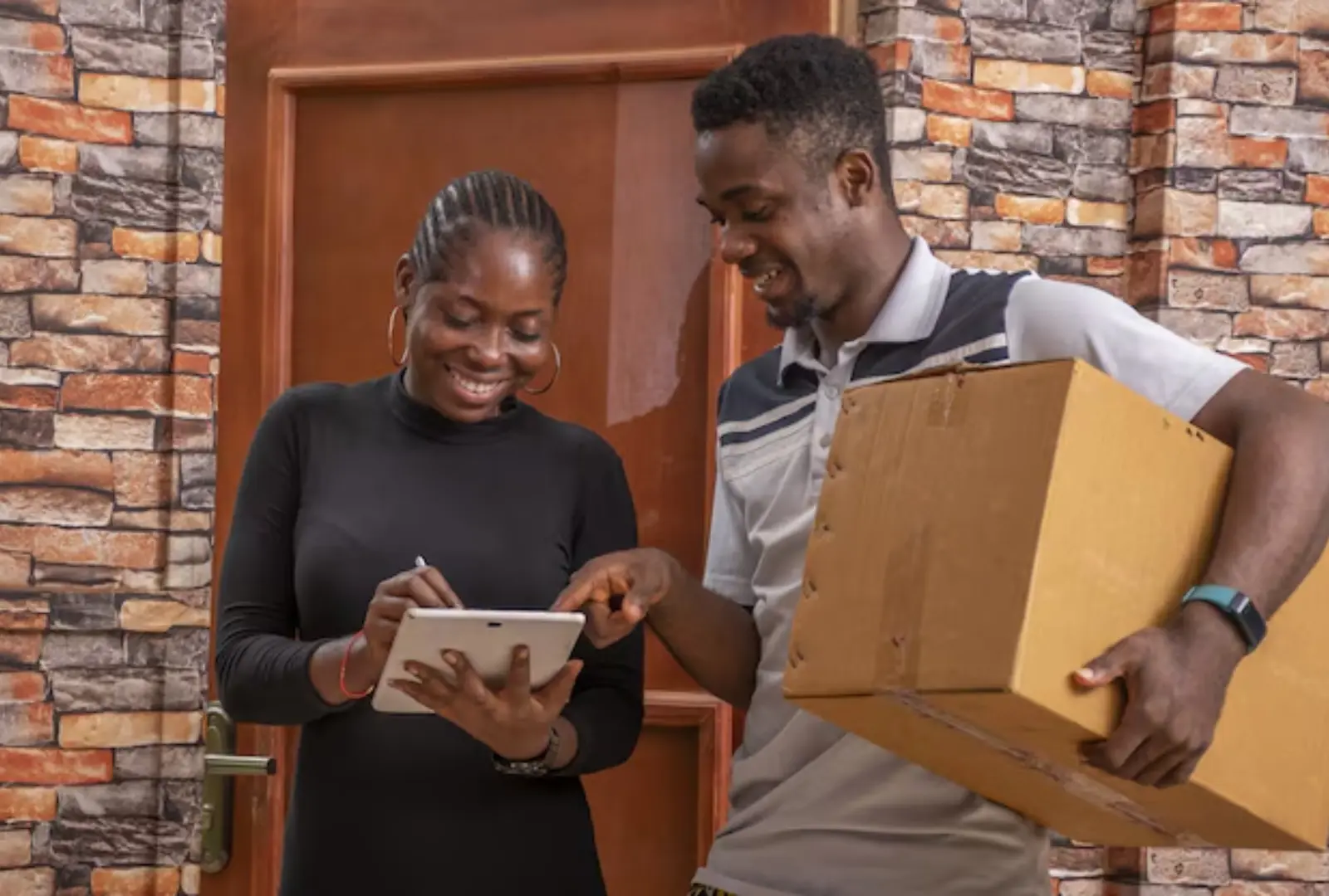 African woman happy with laptop